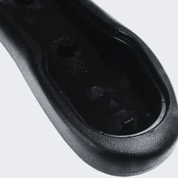 Close-up of the underside of a black Aeron arm pad replacement for classic chairs.