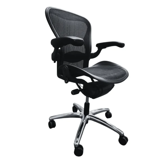 Side angled view of a used refurbished Aeron chair by Herman Miller, showcasing its polished aluminum base and adjustable ergonomic features.