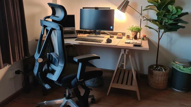 Ergonomic office chair at a modern desk setup with a computer - what is an ergonomic chair